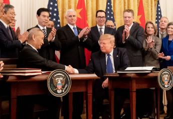 Chinese Vice Premier Liu He and President Donald Trump shake hands after signing phase one of a trade agreement.