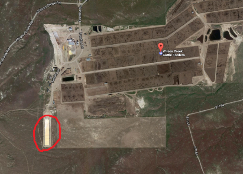 A view of the waste water pit at Wilson Creek Cattle Feeders via Google Maps circled in red.