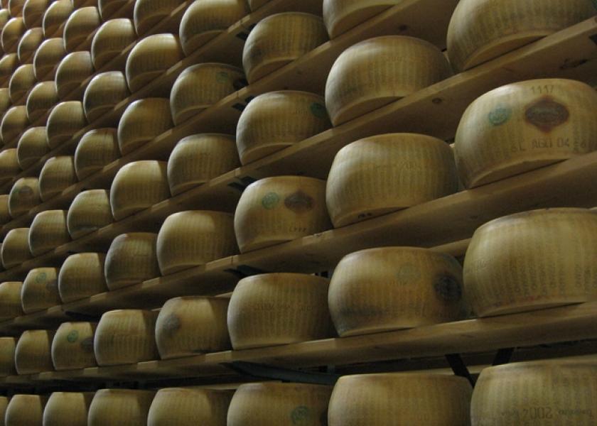 Rounds of Parmigiano Reggiano ripen in a storeroom.